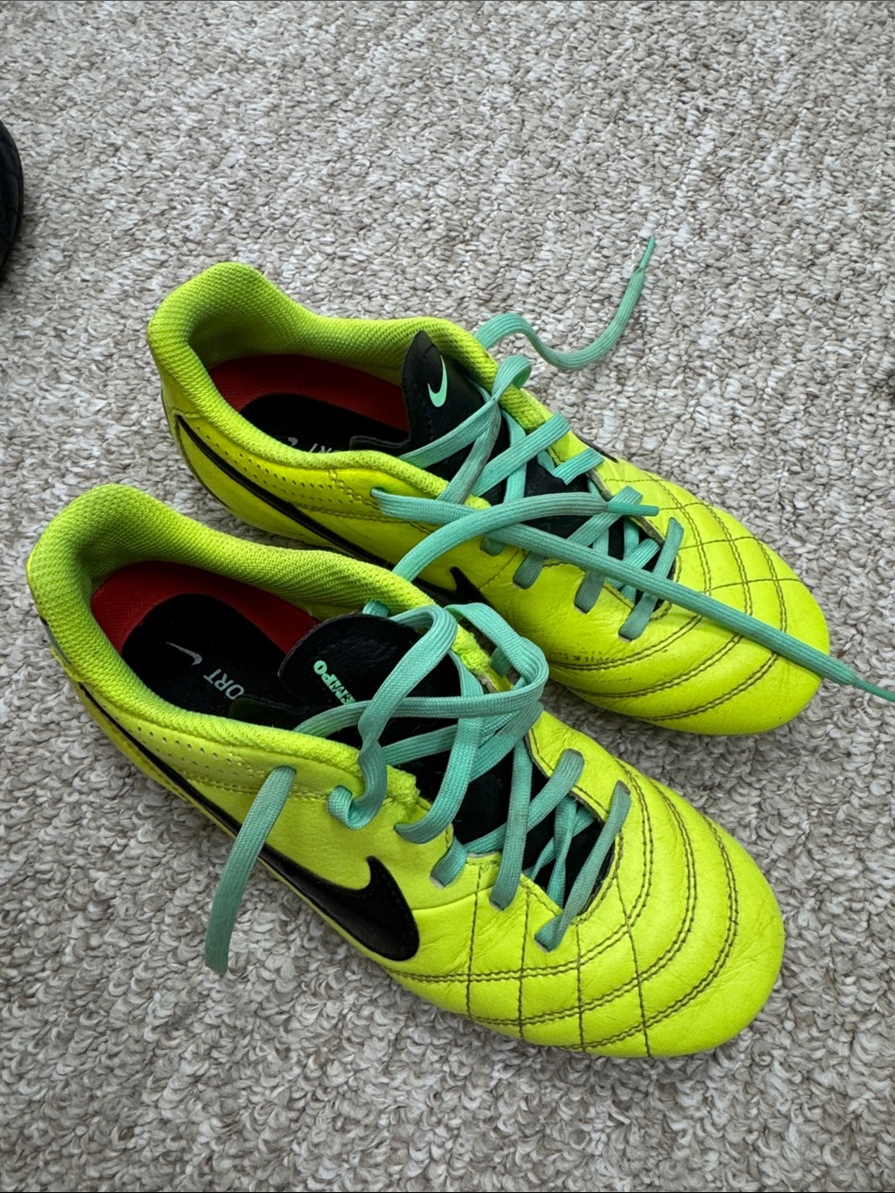 Nike Kids Neon Yellow Soccer Sneakers with Black Swoosh and Mint Laces